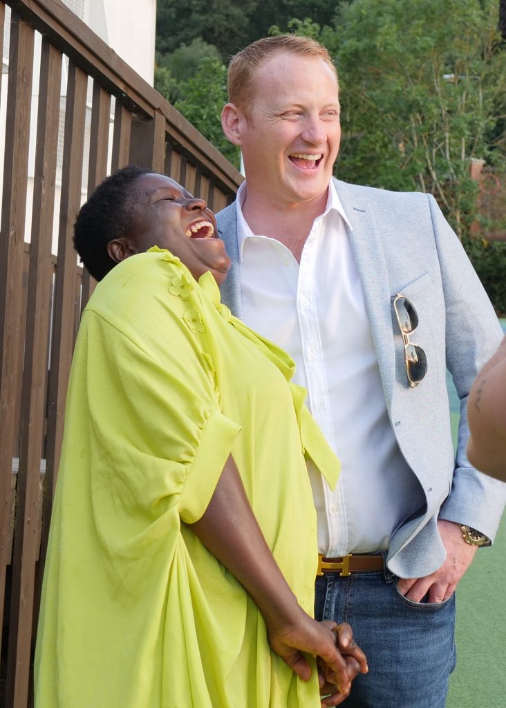 Adam and Kiptieu share a laugh whilst filming for Rich House Poor House